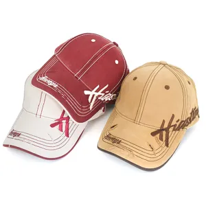 Detailed view of vintage washed baseball caps with side letter embroidery for women.