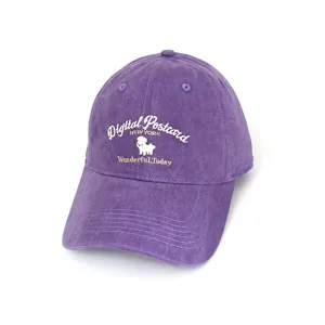 Detail showing vintage purple baseball cap with cute cartoon sheep embroidery detail.