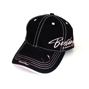 Close-up of the stylish black baseball cap featuring pink stitching and side embroidery.