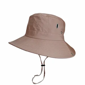 Side detail of a breathable khaki sun hat with vent holes and adjustable chin strap