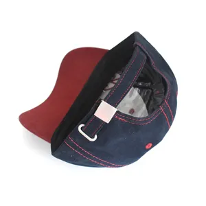 Classic navy baseball cap featuring contrast red stitching and adjustable metal buckle strap.
