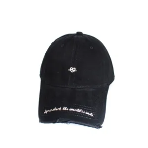 Distressed black cotton baseball cap featuring heart embroidery and quote on the brim