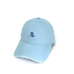 Light blue washed cotton baseball cap detail showing embroidered Bye letter and distressed brim.