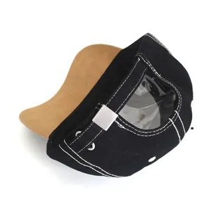 Black baseball cap back detail view showing metal buckle strap and contrast stitching.