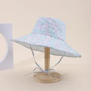 Detail view of floral print wide-brim sun hat with adjustable neck string