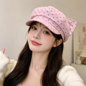 Pink polka dot cat ear newsboy hat detail, cute casual style cap with sparkling rhinestone accent.