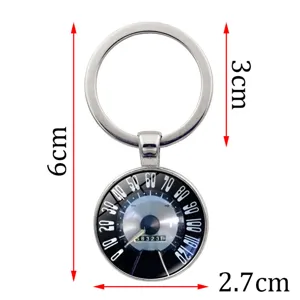 Creative vintage car speedometer dial keychain pendant with detailed measurement dimensions.