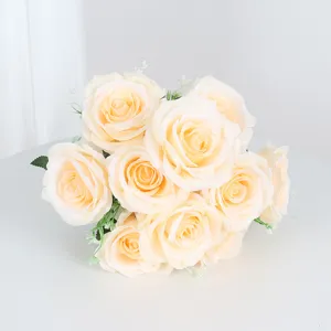 Detailed view of artificial champagne rose bouquet, perfect for romantic wedding decor.