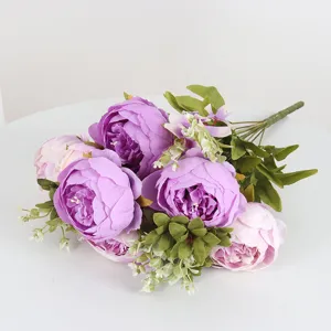 Detailed close-up of artificial peony flower bouquet petals, showing fine texture and vivid color.