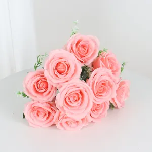 Detail shot of a 10-head pink artificial rose bouquet, perfect for romantic wedding decor.
