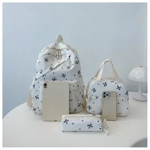 Conjunto de tres mochilas con bonito diseño de lazos y lunares para la escuela y uso diario.