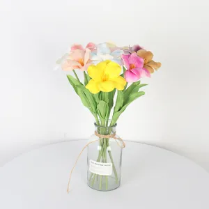 Elegant PU brownie tulip artificial bouquet displayed in a minimalist glass vase for home decor