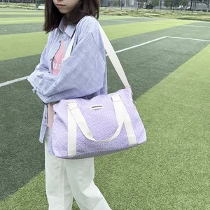 Casual purple pleated travel shoulder bag with white straps for yoga, fitness and daily use.