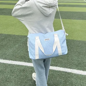 Casual fashion yoga duffel bag with large capacity, crinkle texture, and shoulder straps.