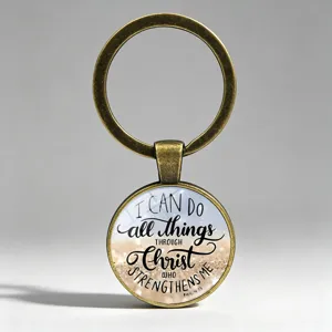 Close-up of glass dome keychain with Philippians 4:13 bible verse design