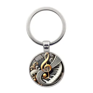 Vintage musical keychain featuring piano keys and a golden treble clef design in metal