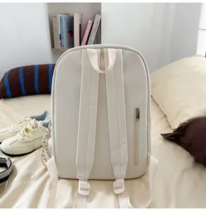 Casual minimalist solid color backpack detail showing back straps and side zipper pocket design