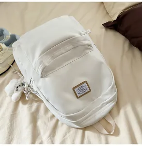 White Japanese Harajuku casual backpack for women and students, large capacity daily school bag.