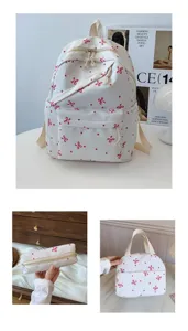 Mochila de lona de tres piezas con bonito lazo rojo y lunares para estudiantes universitarias.