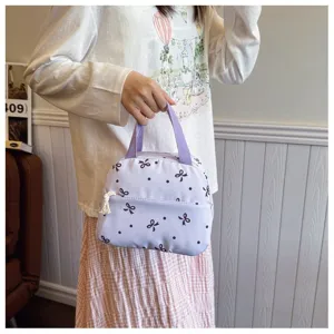 Bolso de mano morado casual con lindo estampado de lazos y lunares, bolsa de tela elegante.
