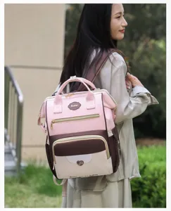 Sac à dos à langer multifonctionnel, grande capacité pour maman en déplacement.
