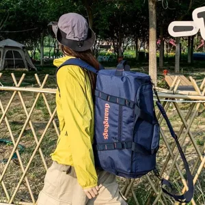 Large capacity navy blue camping storage bag for outdoor travel with shoulder straps
