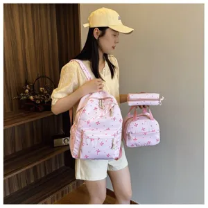 Conjunto de mochila rosa de 3 piezas para mujer, bonito diseño de lazo, bolso escolar y viaje casual.