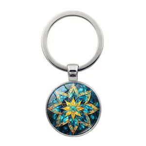 Vintage mandala keychain with blue and gold star pattern in glass cabochon and metal ring