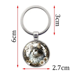 Silver metal cat keychain detail showing 6cm total length and 2.7cm pendant diameter
