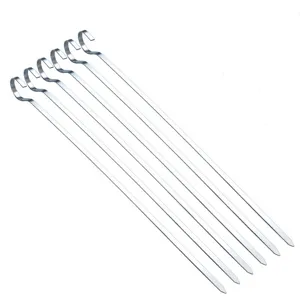 Stainless steel flat BBQ skewers detail view, durable metal kebab sticks for outdoor grilling.