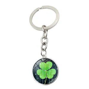 Close-up of a shamrock keychain featuring a crystal glass pendant with green clover