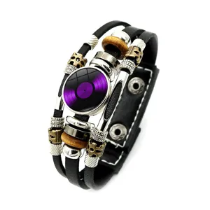 Detailed view of a retro punk leather bracelet featuring a unique purple vinyl record charm