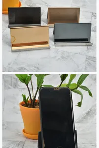 Minimalist stainless steel business card holder set used as a smartphone stand for desk