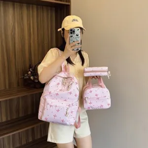 Conjunto de mochila de 3 piezas con estampado de lazo rosa para mujer, bolso escolar y de viaje.