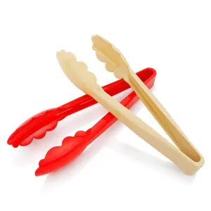 Professional plastic food tongs in red and cream beige for serving bread and pastry items