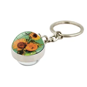 Detail view of glass cabochon keychain featuring Van Gogh's Sunflowers artwork