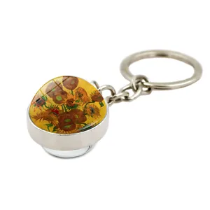 Detail of double-sided glass ball keychain featuring Van Gogh's Sunflower painting.