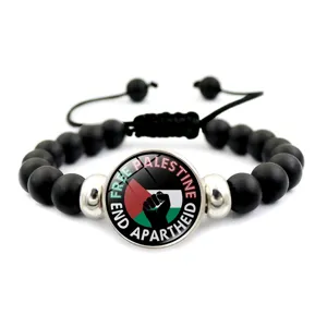 Bracciale regolabile con perline nere e cabochon Free Palestine ed End Apartheid