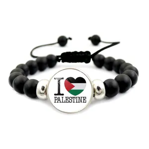 Bracciale regolabile di perle nere con cuore della bandiera della Palestina
