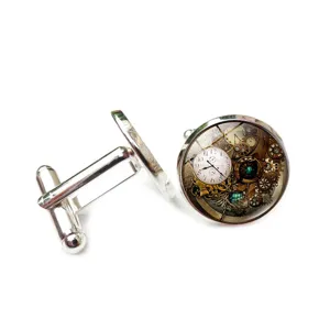 Detailed view of steampunk cufflinks featuring intricate mechanical gear designs.
