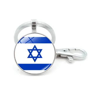 Detail view of the Israel flag glass cabochon keychain featuring a silver lobster clasp
