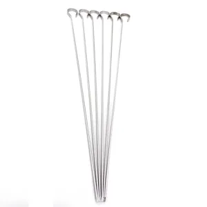 Stainless steel barbecue skewers set, durable metal grilling sticks for outdoor camping use.