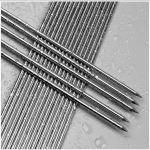 Hochwertige Grillspieße aus Edelstahl, rund, mit scharfer Spitze und metallischem Finish.