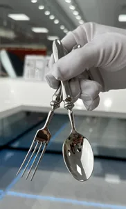Macro view of luxury 304 stainless steel fork and spoon set with gourd handle design
