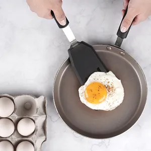 Silicone spatula kitchen cooking utensil for frying eggs, ergonomic handle main product view.