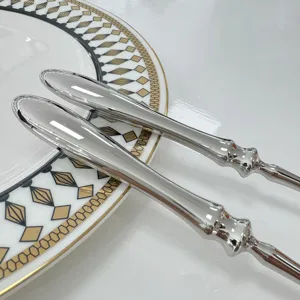 Luxury 304 stainless steel knives with elegant gourd handles on decorative plate
