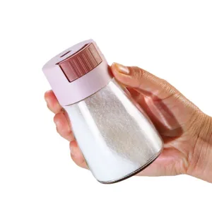 Handheld quantitative glass salt shaker bottle with pink lid for kitchen seasoning storage