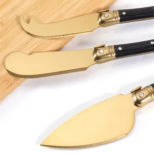 Hochwertiges 3-teiliges goldene Titan-Käsemesser-Set mit eleganten schwarzen Griffen und Bolster