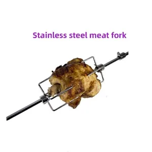 Professional stainless steel rotisserie meat fork spit with roasted whole chicken.