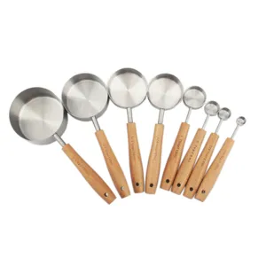 Detailed overhead view of 8-piece stainless steel measuring set with beechwood handles